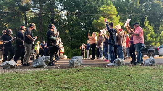Students in the Field Force Operations Course encounter protesters blocking a road during a training exercise. | Center for Domestic Preparedness