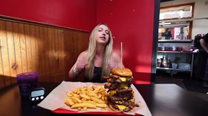 Girl attempts an undefeated octuple bacon cheeseburger challenge