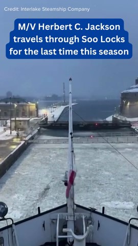 Shipping freighter travels through the Soo Locks for the last time this shipping season