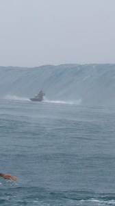 2.2M views · 15K reactions | Rain pouring, spray blasting our lenses in the channel—then Aelan Vaast drops into the wave of her life. A board shoots across her line, she dodges, and it puts her even deeper. The crowd erupted.One of the wildest moments we’ve ever filmed! | Rogue.TV | Facebook