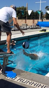 Backstroke dive drills with Amy Bilquist. Notice how she kicks the ball with her feet to put her body in a better position. Her feet are more parallel before the entry when she is trying to hit the ball than without it. This is a great drill to do with a partner, especially during taper time to have more fun and work on explosive power. Try it out yourself and tag us for a chance to be featured! #theraceclub #swimmer #backstroke #fun #throwback #drills #dives | The Race Club