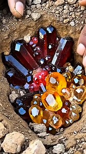 red gemstones buried in mining soil #diamond #crystals #gemstones #gold #jade #agate #petrifiedwood | Agate Hunter Rimba