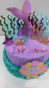 Experience enchantment with our mermaid cake at Sienna Bakery in Harvest Market. 🧜‍♀️🍰 Customize and visit today! | Harvest Market