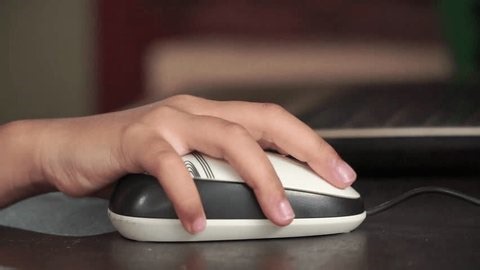 clip-4019109625-young-child-using-computer-mouse-digital-learning