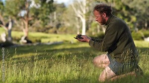 taking a soil sample for a soil test in a field. Testing carbon sequestration and plant health