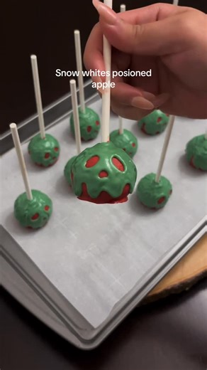 AngelSweets on Instagram: "Poison apple cake pops 🍎 1 cup flour 1 cup sugar 1/3 cup cocoa powder 1 tsp baking powder 1/2 tsp baking soda 1 tsp salt 1/2 cup water 1/4 cup oil 1 egg 1/2 cup buttermilk 1 tsp vanilla Green & red candy melts In a bowl, mix together flour, sugar, cocoa powder, baking powder, baking soda, and salt. In another bowl, pour in water, buttermilk, oil, egg, vanilla, and coffee. Whisk and pour into the dry mixture. Mix and pour into a greased and line pan. Bake at 350F for 3