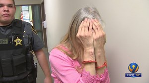 Woman opens fire on cell tower workers hundreds of feet in the air, sheriff says