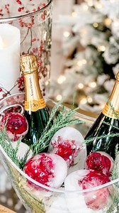 Holiday Floral Ice Spheres ❄️I recreated my viral 65M floral ice spheres for the holiday season! Frozen rose ice spheres are a wonderful way to decorate and keep bottles cold for your Christmas and Winter gatherings. Enhance your table setting or party decor with a touch of sophistication, a burst of color, and unique elegance that is sure to leave a lasting impression on your guests!To make them, follow these simple steps: 1. Cut the stems off fresh roses, leaving only the flower heads. (Faux f