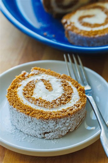 Our homemade Pumpkin Roll is airy and delicious! Recipe: https://natashaskitchen.com/pumpkin-roll-recipe/ | NatashasKitchen.com