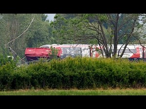 Several injured after train hits tractor at level crossing | SWNS