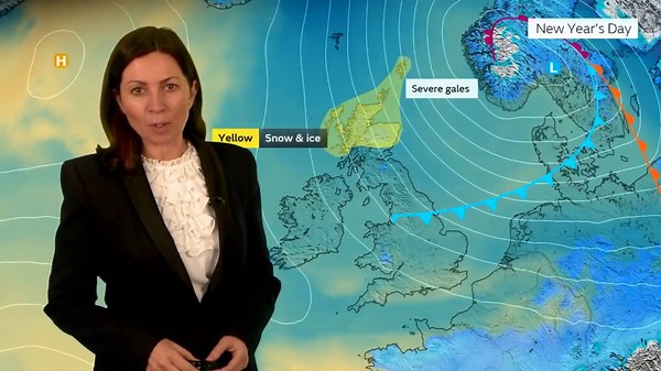 UK rings in New Year with snow and ice weather warnings