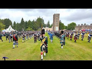 Scotland the Brave as Drum Majors lead Pipes and Drums march at 2025 Gordon Castle Highland Games