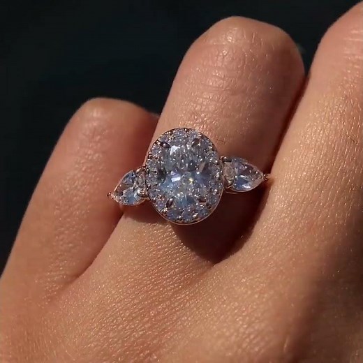 3 Stone Oval Diamond Halo Engagement Ring