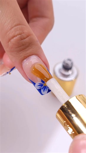 40K views · 363 reactions | Blue & White Floral Nails Tutorial | Cool But Sweet Vibes SLAY! Nude base + french tips with blue flowers—obsessed! Super easy steps, even newbies can NAIL it! Do it with Venalisa Gel Nail Polish to achieve the nails perfection! Tag your bestie / nail tech to glow up together ✨ #NailTutorial #Flowernails #summernails#NailArt #fyp | Venalisa | Facebook