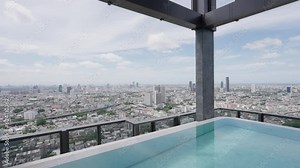 Immerse yourself in luxury in an infinity pool with a breathtaking city view. Skyscrapers reach for the sky, their reflection shimmering in the pristine water. A seamless blend of relaxation