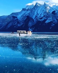 Skating on the crystal clear ice in Canada | Our Planet