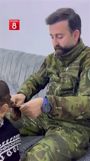 A Peshmerga braids his daughter’s hair as a symbolic gesture of solidarity with the Kurdish women fighters in Rojava. Channel8 has launched the #شکۆی_کەزی campaign, with widespread participation and growing engagement under the hashtag. | Channel8 English