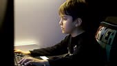 kid playing video games at home, young gamer playing 3d video games...