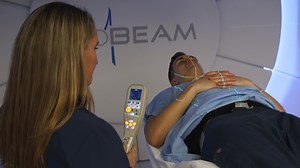 Proton Therapy Delivery and Its Clinical Application in Select Solid Tumor Malignancies