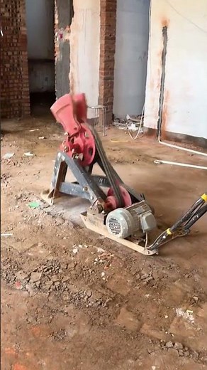 Powerful Plate Compactor in Action: Preparing the Floor for Concrete