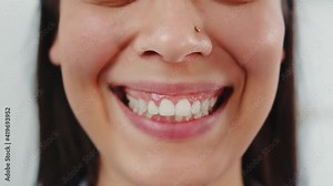 Perfect woman teeth close up. A woman who sincerely smiles and has white clean teeth.