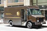 Images of Package Delivery Company With Brown Trucks