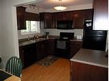 Black Stainless Appliances With Cherry Cabinets Pictures
