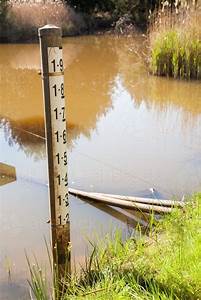 Image Of Water Level Depth Indicator In A Regional Creek Crossing