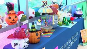Baton First Responders Decorate Halloween Pumpkins To Give To