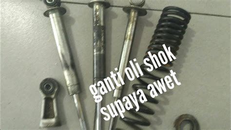 merek seal shock belakang motor