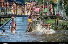 tribe asmat noisy bathe guinea