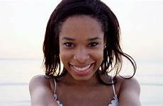 4k videos shutterstock related selfie ethnic sand smiling success ocean african portrait dream young beach american girl stock