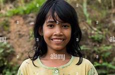indonesian girl smiling portrait camera looking alamy stock