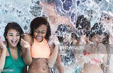 teenagers waterpark soaked multiracial