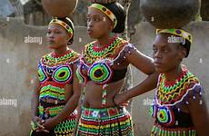 zulu traditional girls dress beaded wearing pots carrying their africa village heads shakaland natal kwazulu