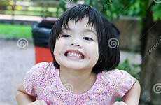 outdoor playground playing portrait enjoy asian little girl preview casual