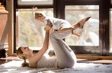 baby yoga poses mother pose exercising mama fun loss weight mom viparita karani legs wall after hom attractive yogi daughter