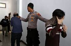 sex men indonesia gay having caning indonesian people two sentenced other each courtroom party sharia they trial aceh banda stories