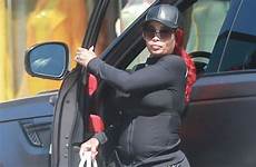 blac chyna flaunts pregnant famous mirror bump keeps covered tight pants bottom very baby but