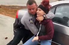 police officer teen tackled ground after car being carolina north woman teenage harnett county slamming her investigation sisters under filmed