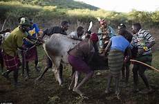 tribal ceremony traditional wedding women kenya cattle slaughtered dowry men part bull girls brutal unlikely hardships tradition suffered parents hands