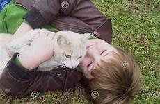 hugging field cat boy stock