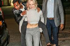 piggyback lawrence jennifer aziz ride ansari gives party abs steel popsugar nyc outside saturday night live after infphoto flashes giving