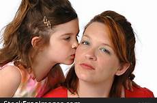 kissing mom daughter stockfreeimages