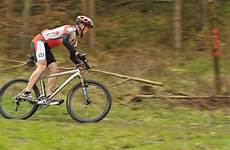 bike cycling mountain bicycle races racing cross biking country sport race man forest competition professional land cycle road sports cyclo