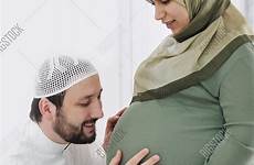 muslim pregnant wife husband her belly