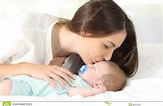 kissing baby her affectionate sleeping mother preview