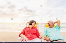 older beach couple stock jupiter relaxing florida usa alamy