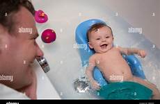 daddy bath dad bathtime baby stock alamy father