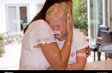 crying mother comforting child alamy